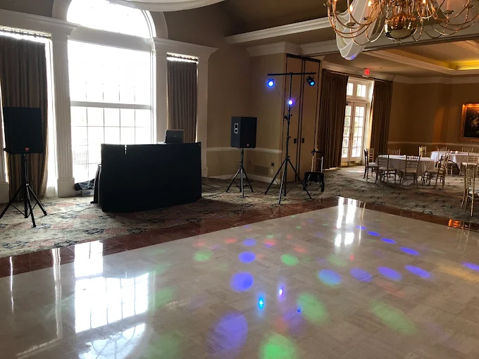Wedding reception with uplighting and a full dance floor